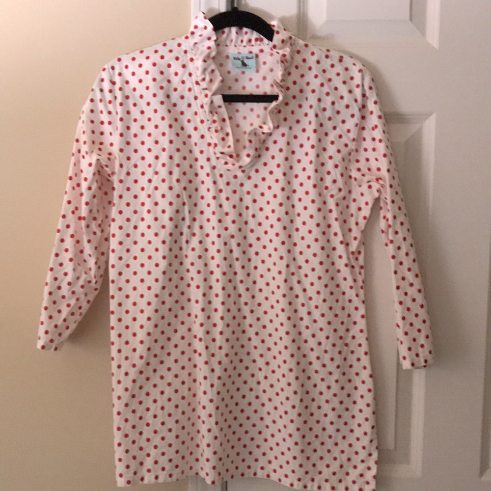 Small red, glitter dot tunic with ruffled neckline.